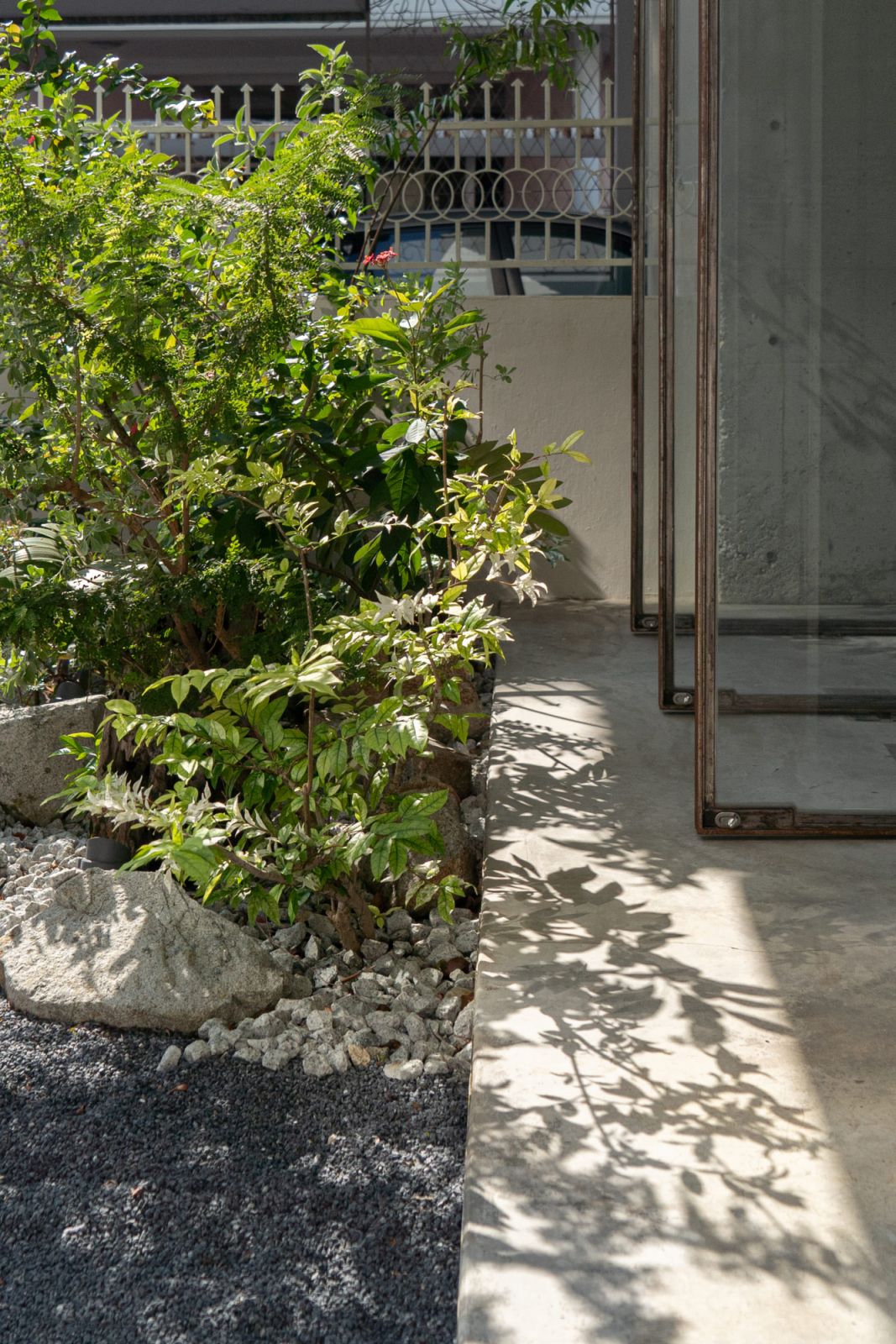 Greenery festoons the office frontage