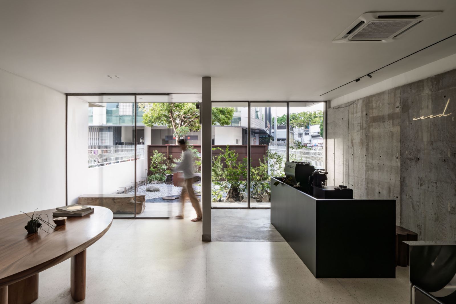 The studio has a clear view of the garden