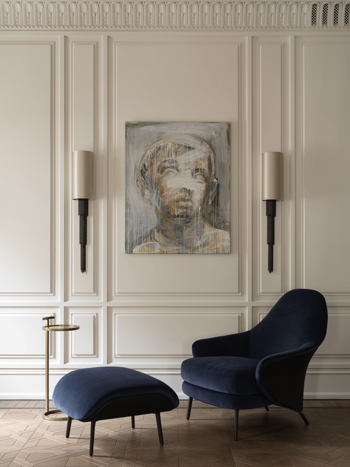 The family's art collection on display in the home, complementing their custom-made wood panels and cornices and custom-made furniture