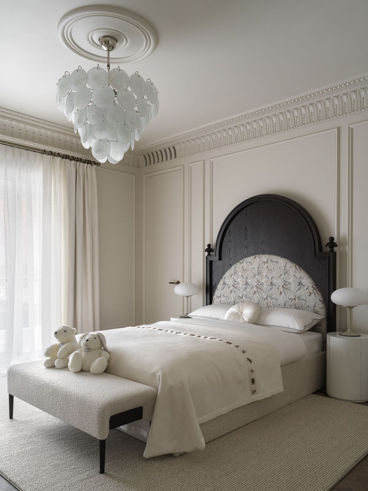 One of the children's bedrooms in a neutral palette, with exquisite cornices