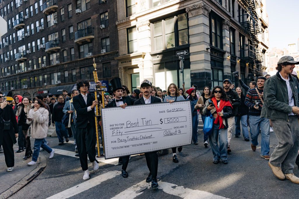 MANHATTAN, NY - Oactorber 27 : Organizers walk during a Timothee Chalamet lookalike contest in New York on Oct 27, 2024. (Photo by Jeenah Moon for The Washington Post via Getty Images)