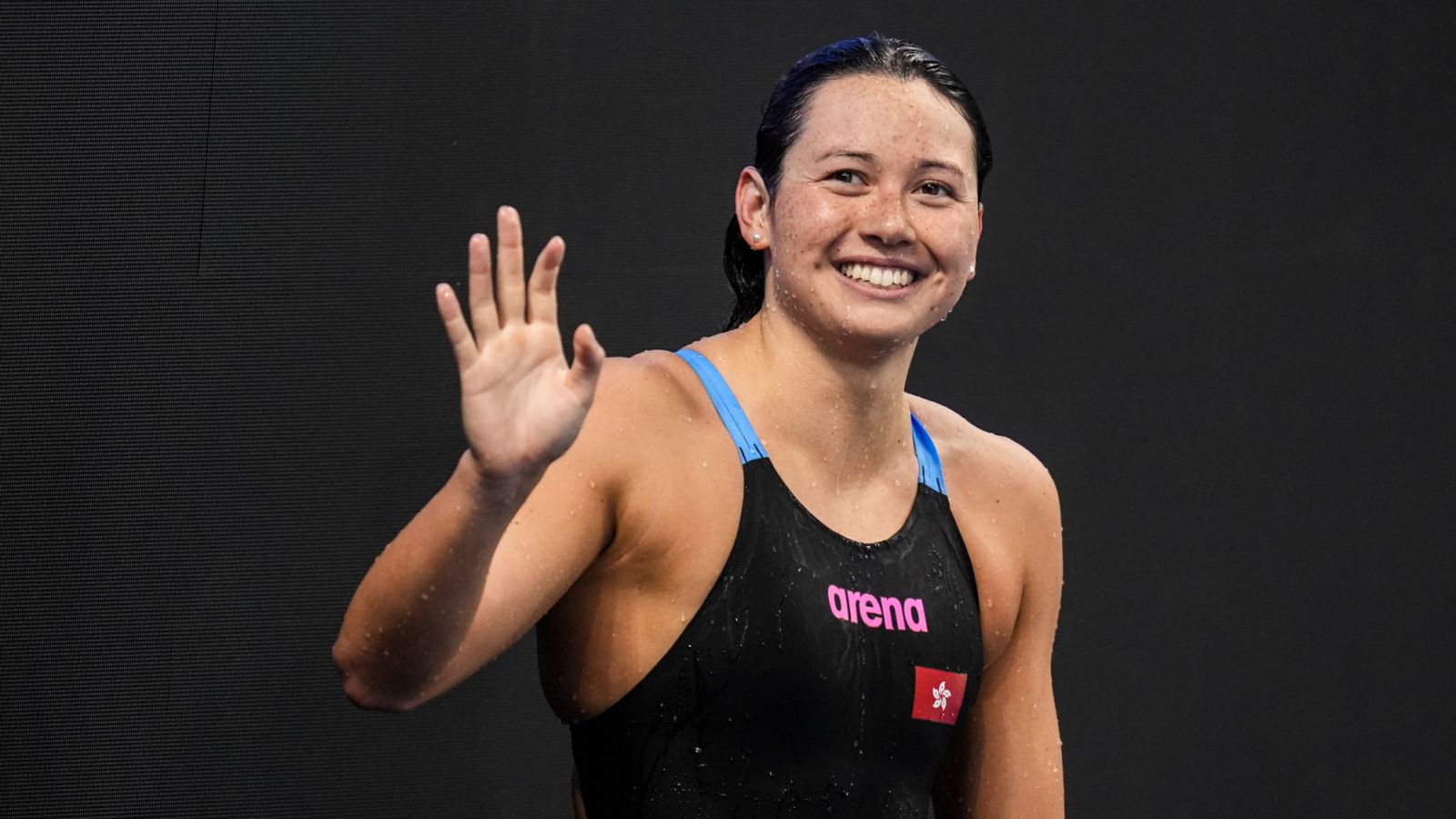 SHANGHAI, CHINA - OCTOBER 20: Siobhan Bernadette Haughey of Hong Kong waves to fans after winning the Women's 100m Freestyle Final during day three of the World Aquatics Swimming World Cup 2024 Shanghai stop at Oriental Sports Center on October 20, 2024 in Shanghai, China. (Photo by Shi Tang/Getty Images)