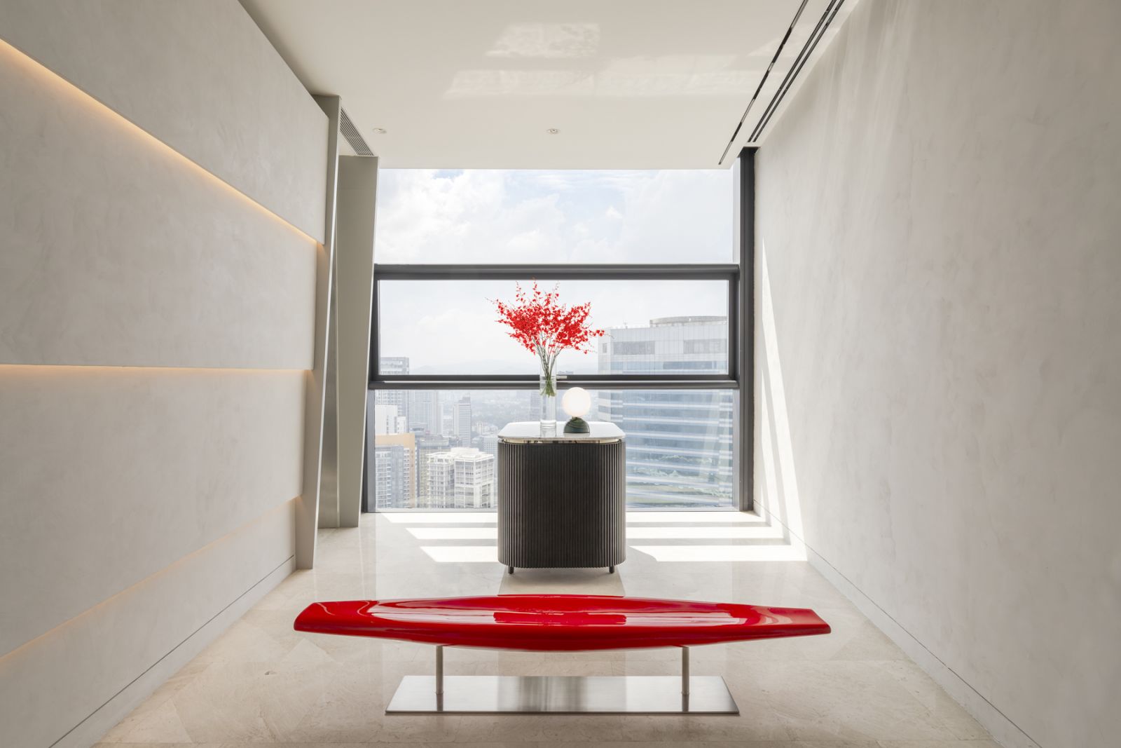 Jean-Marie Massaud’s InOut bench takes pride of place in the private lift lobby