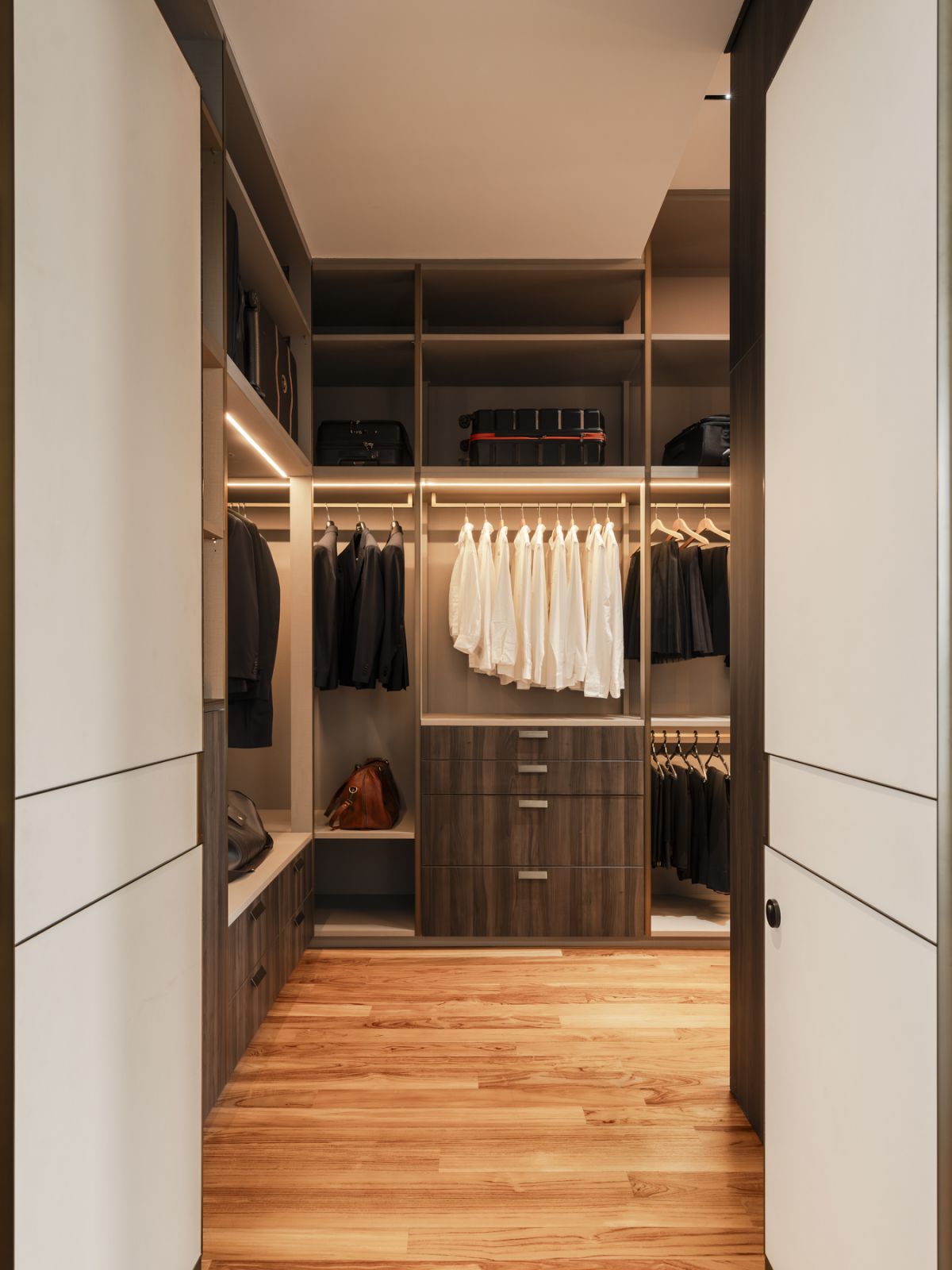 The walk-in closet behind a hidden door