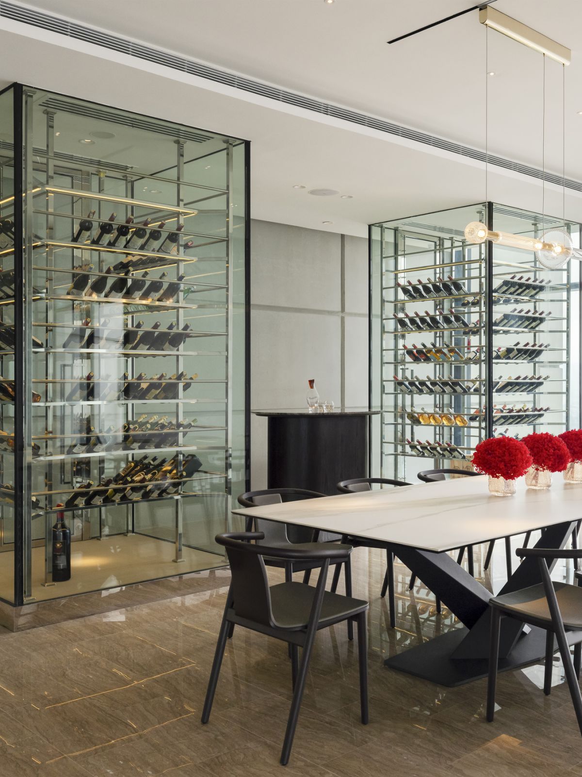 The “glass lanterns” house the client’s impressive wine collection