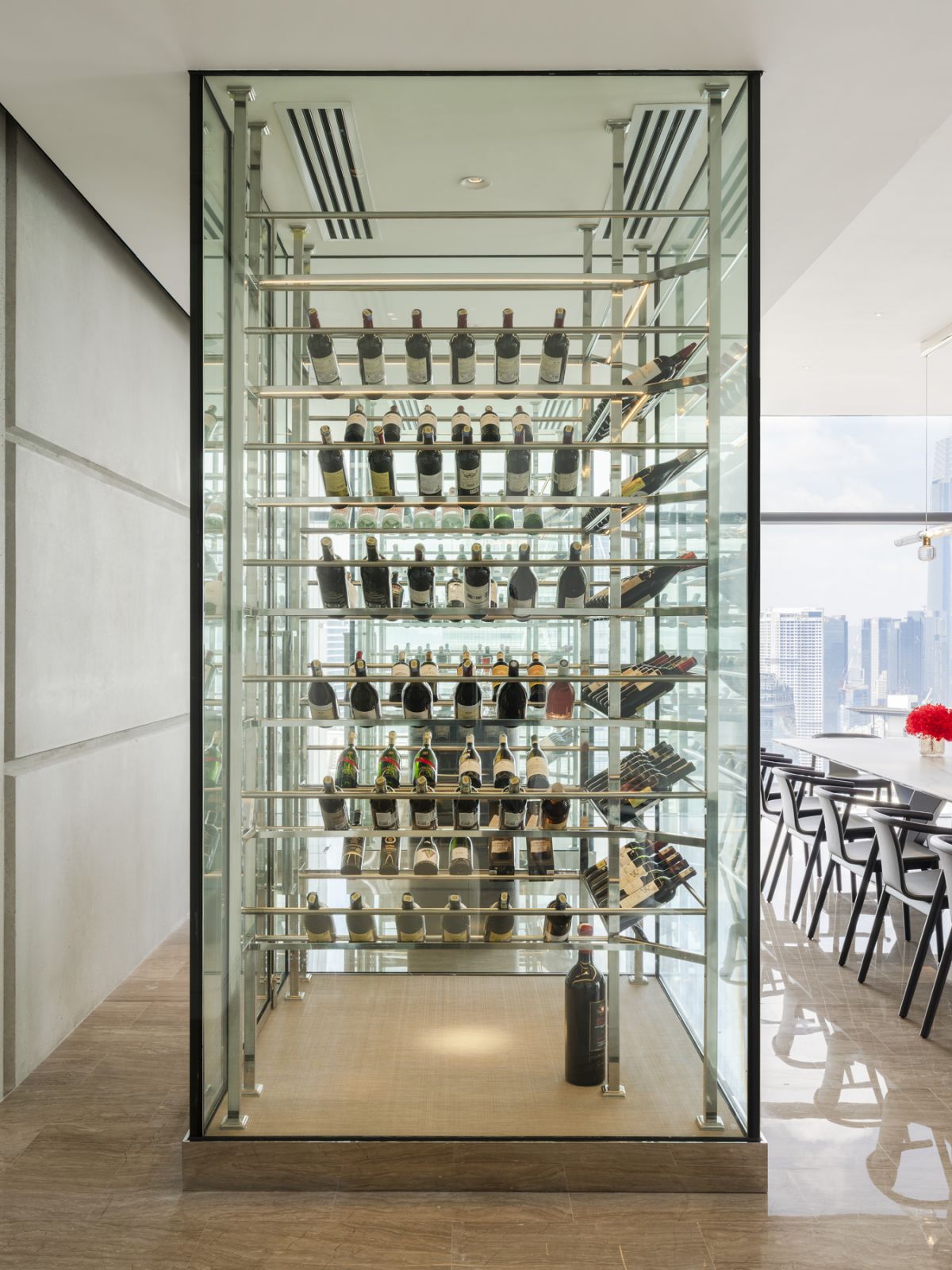 The “glass lanterns” house the client’s impressive wine collection