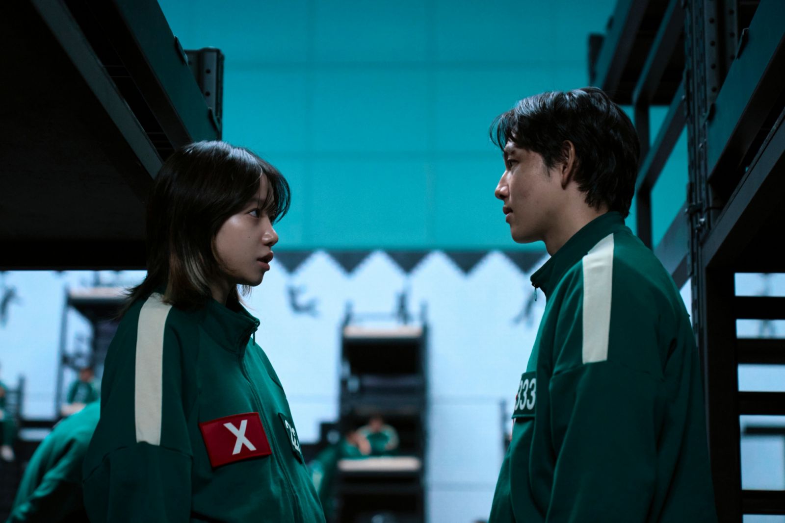 Jo Yu-ri as Kim Jun-hee and Im Si-wan as Lee Myung-gi in ‘Squid Game: Season 2’
