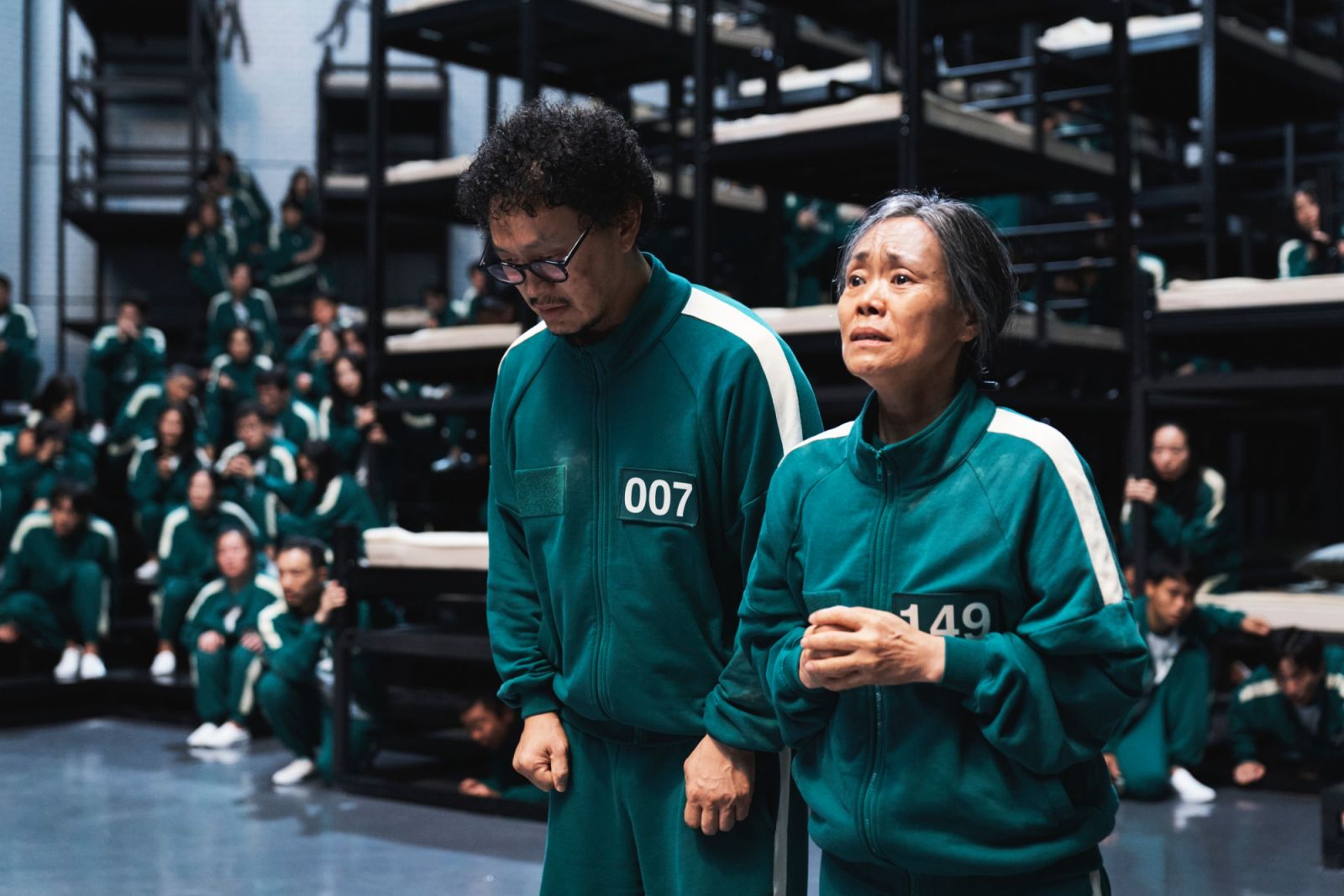 Yang Dong-geun as Park Yong-sik and Kang Ae-sim as Jang Geum-ja in ‘Squid Game: Season 2’