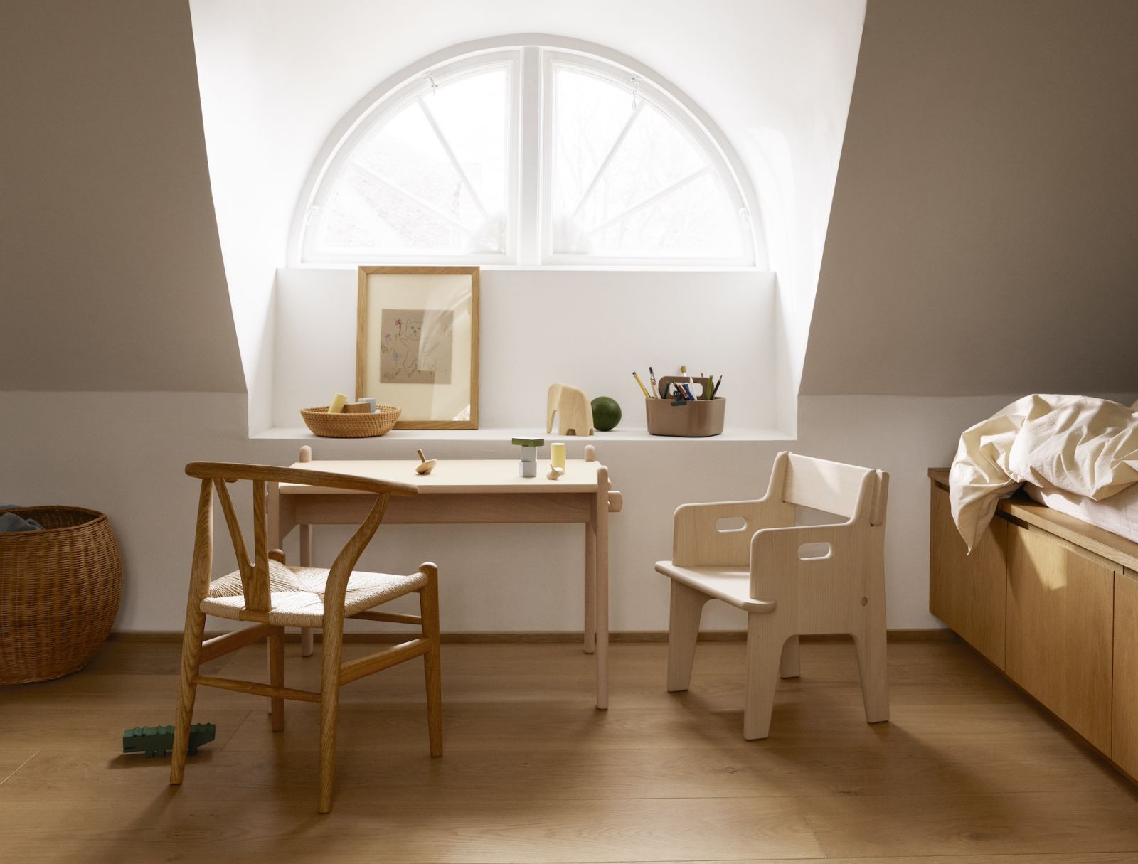 A child-size version of the Wishbone chair and Peter’s Chair and Table, all by Hans J Wegner (Photo: Carl Hansen & Søn)