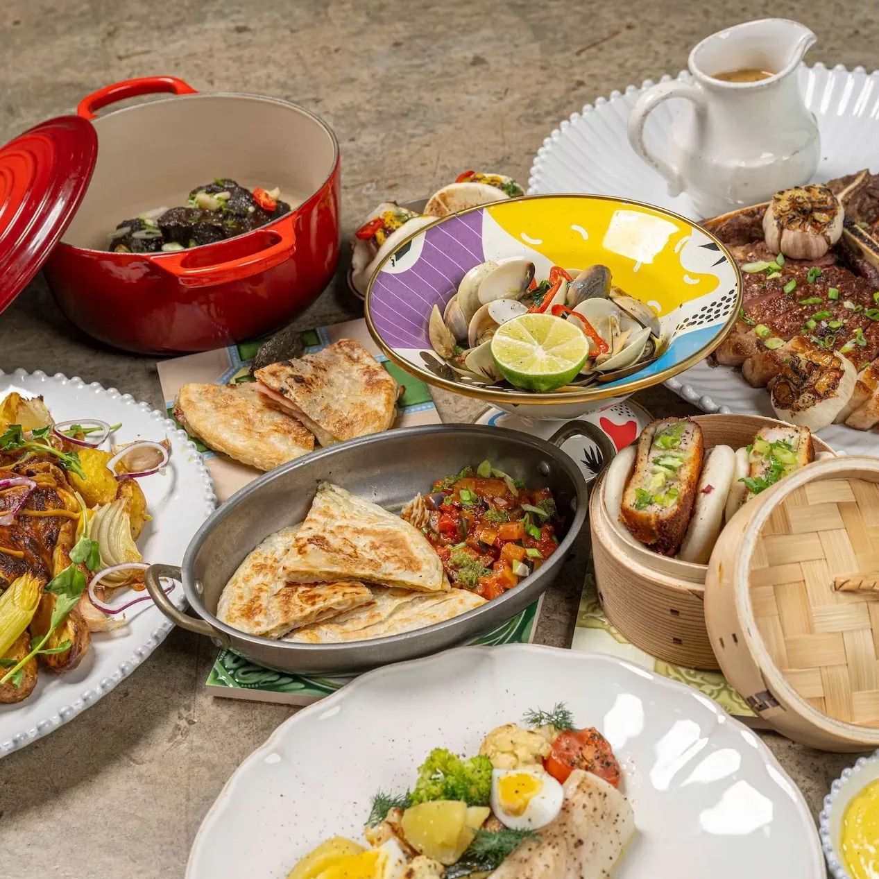 Food spread at Les Ducs, championing French comfort food reimagined with Asian influences (Photo: Les Ducs)