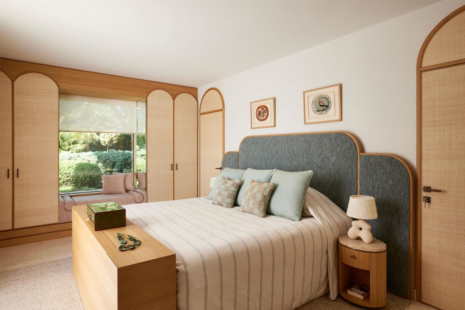Bespoke straw, oak doors and cabinetry with rounded arches (Photo: Francis Amiand)