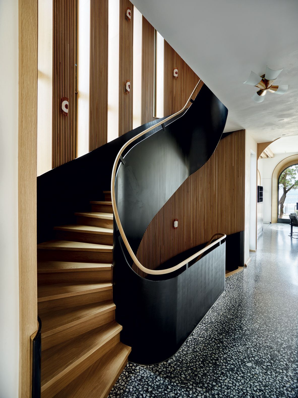 Fluted white oak panels with blackened stainless steel finish (Photo: Richard Powers)