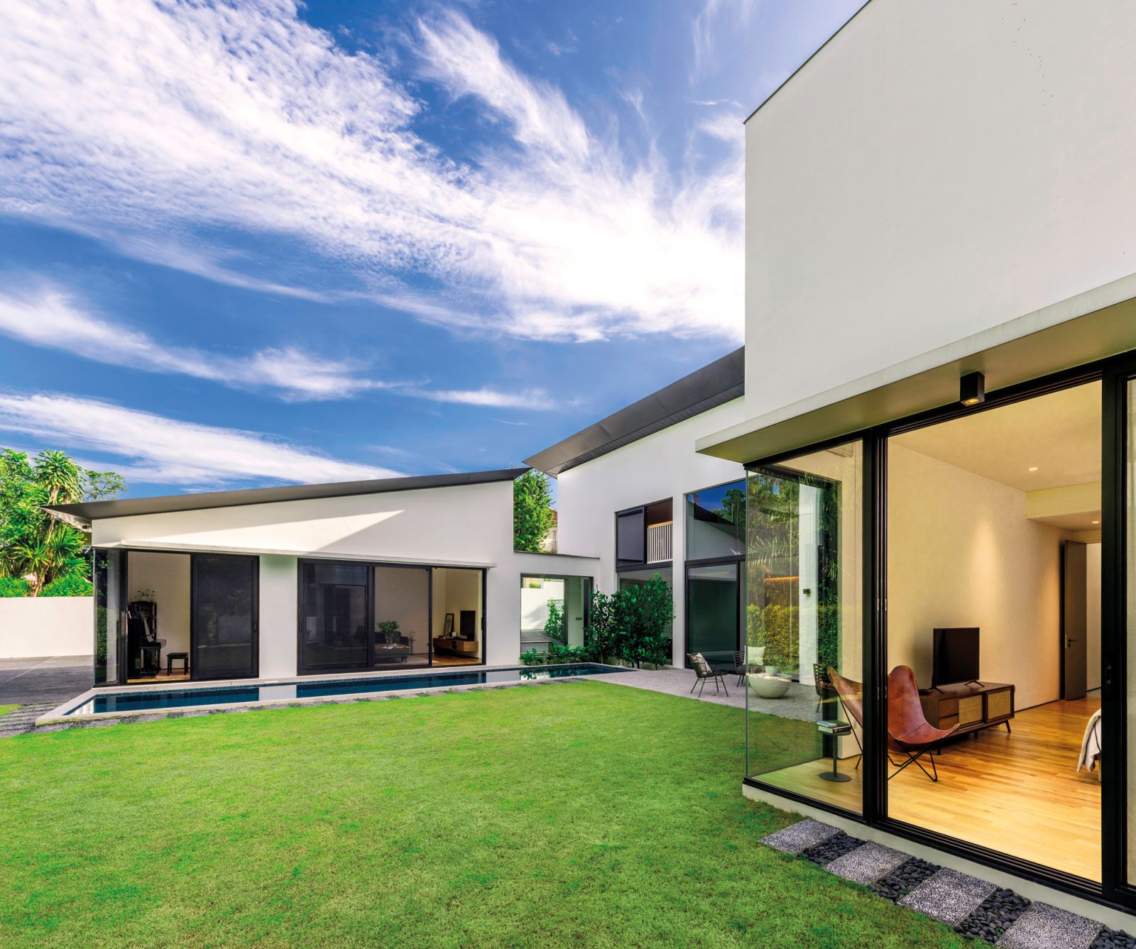 This wing incorporates a secondary living room that can also double as a guest room