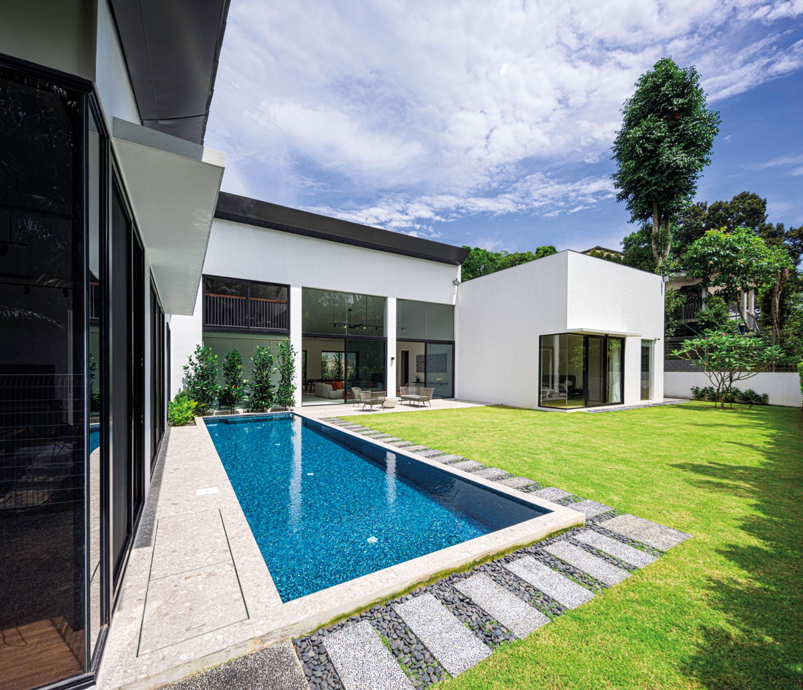 The house eschews unnecessary ornamentation for sleek mid-century modern lines