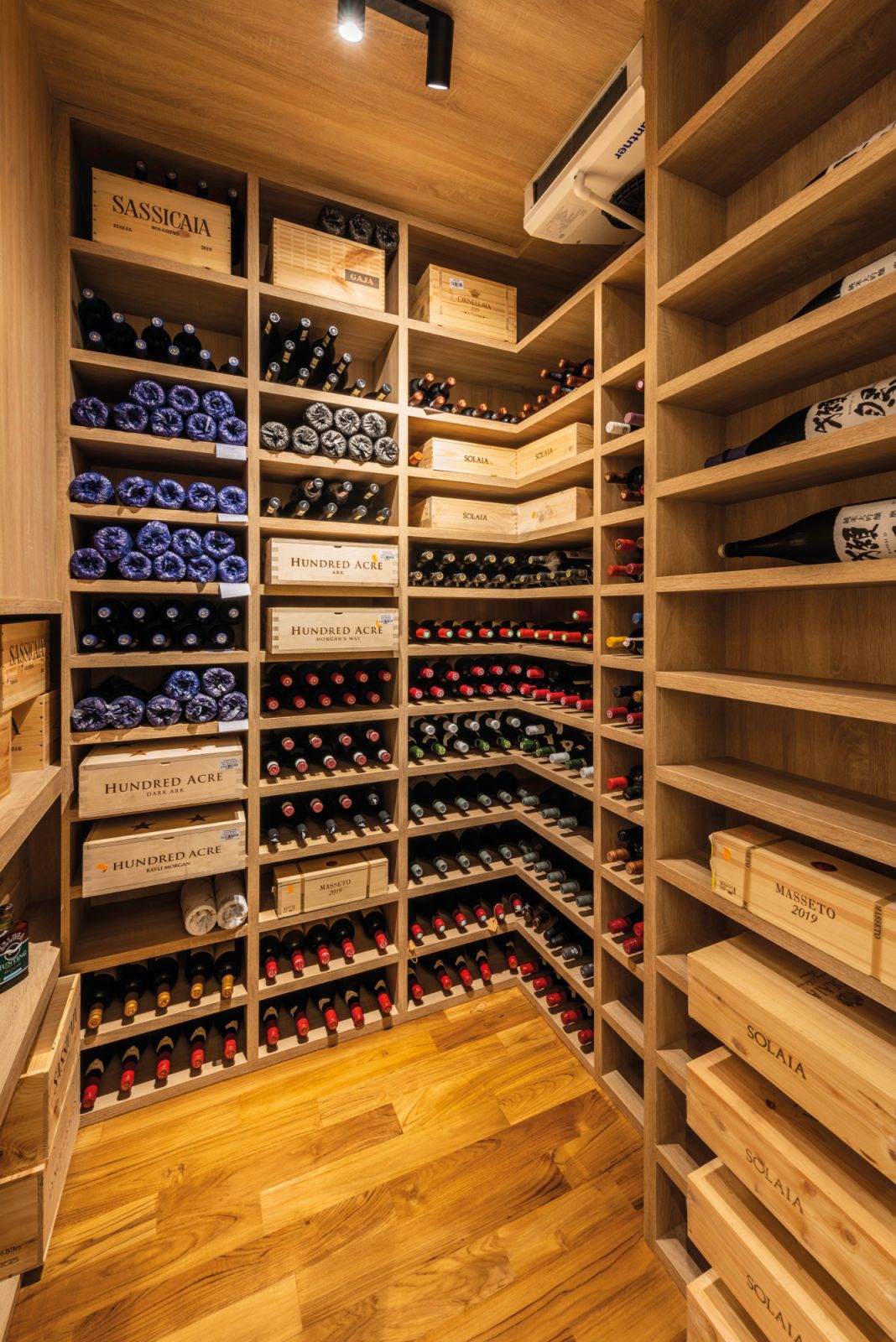 The walk-in wine cellar houses an extensive selection of spirits