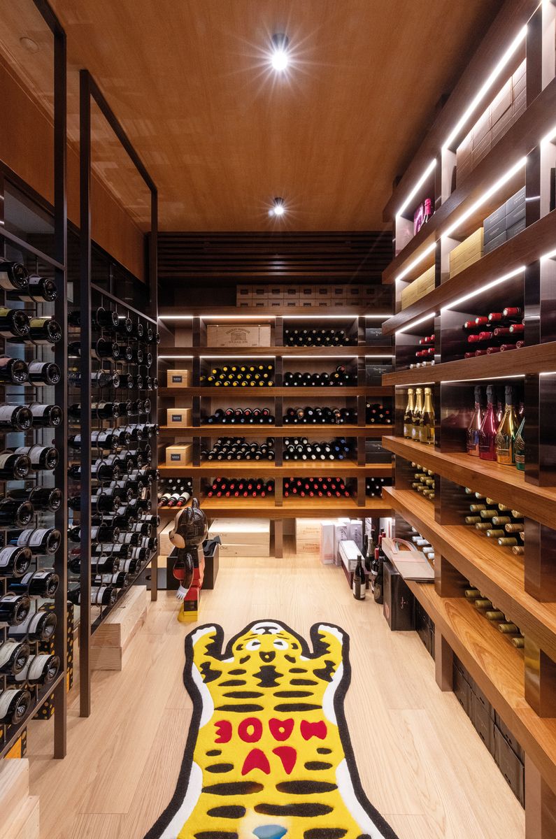 The climate-controlled wine cellar is also decorated with playful art pieces