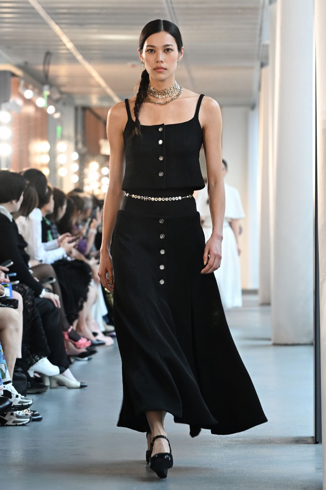 HONG KONG, CHINA - NOVEMBER 05: A model walks the runway during the CHANEL Cruise 2024/25 Hong Kong Replica Show at the Hong Kong Design Institute on November 05, 2024 in Hong Kong, China. (Photo by Billy H.C. Kwok/Getty Images for CHANEL)