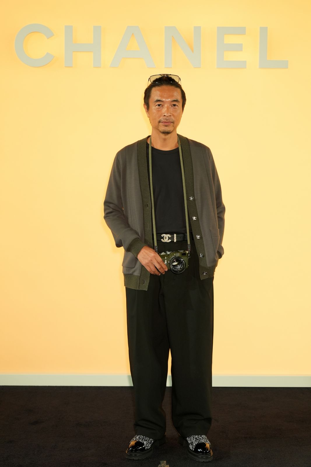 HONG KONG, CHINA - NOVEMBER 05: Man Lim Chung attends the the CHANEL Cruise 2024/25 Hong Kong Replica Show at the Hong Kong Design Institute on November 05, 2024 in Hong Kong, China. (Photo by Anthony Kwan/Getty Images for CHANEL)