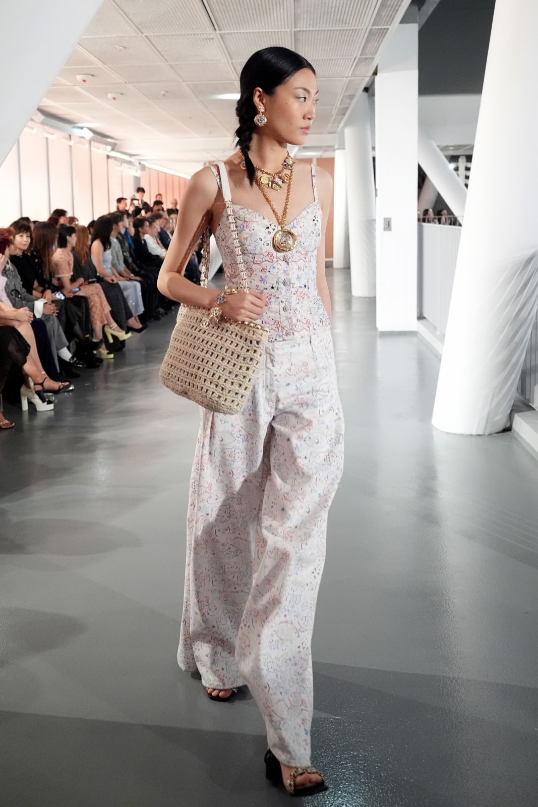 HONG KONG, CHINA - NOVEMBER 05: A model walks the runway during the CHANEL Cruise 2024/25 Hong Kong Replica evening show at the Hong Kong Design Institute on November 05, 2024 in Hong Kong, China. (Photo by Anthony Kwan/Getty Images for CHANEL)