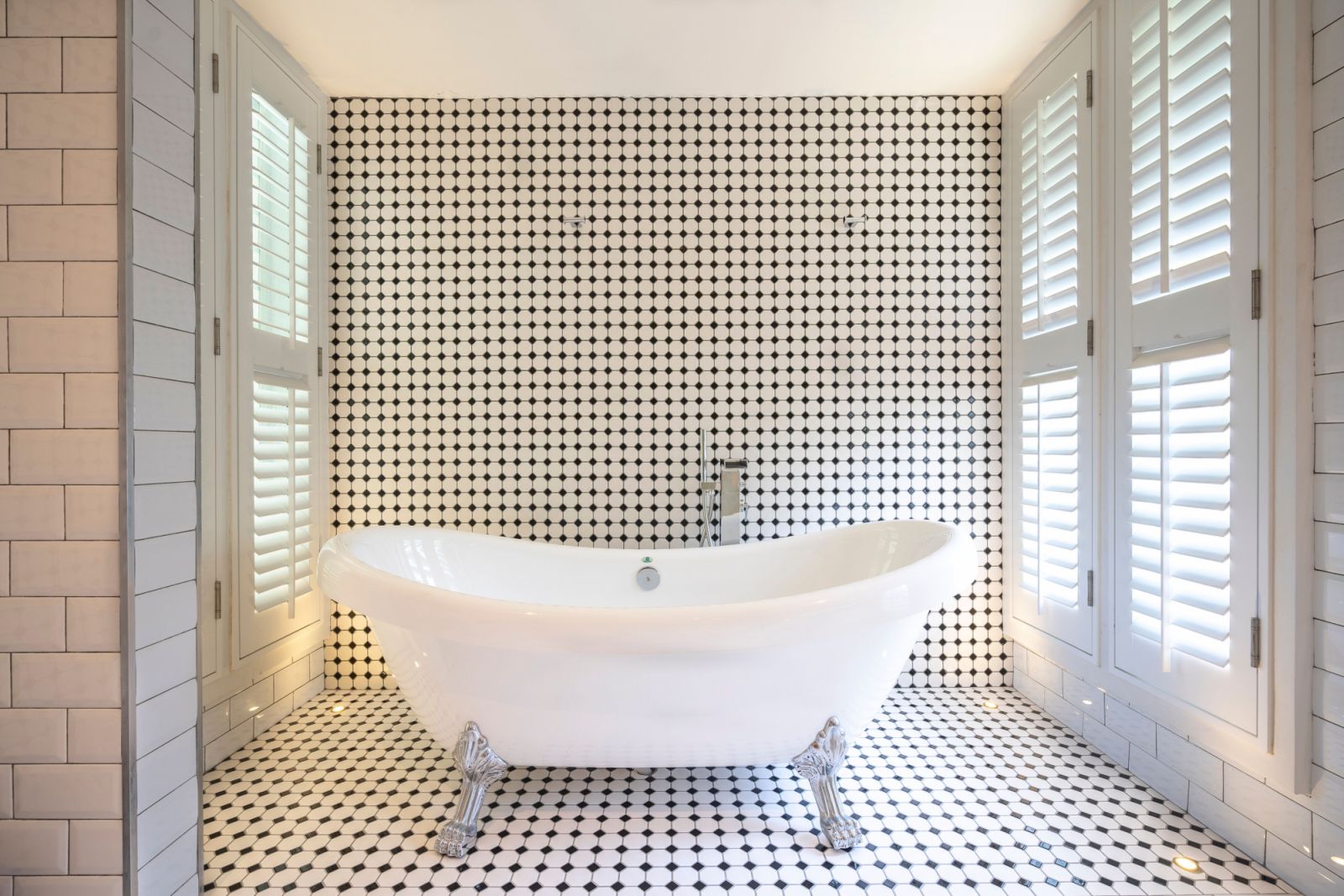 Bathroom flooring with more grooves and joints for ease of water flow and non-slip traction (Photo: Linear Vista)