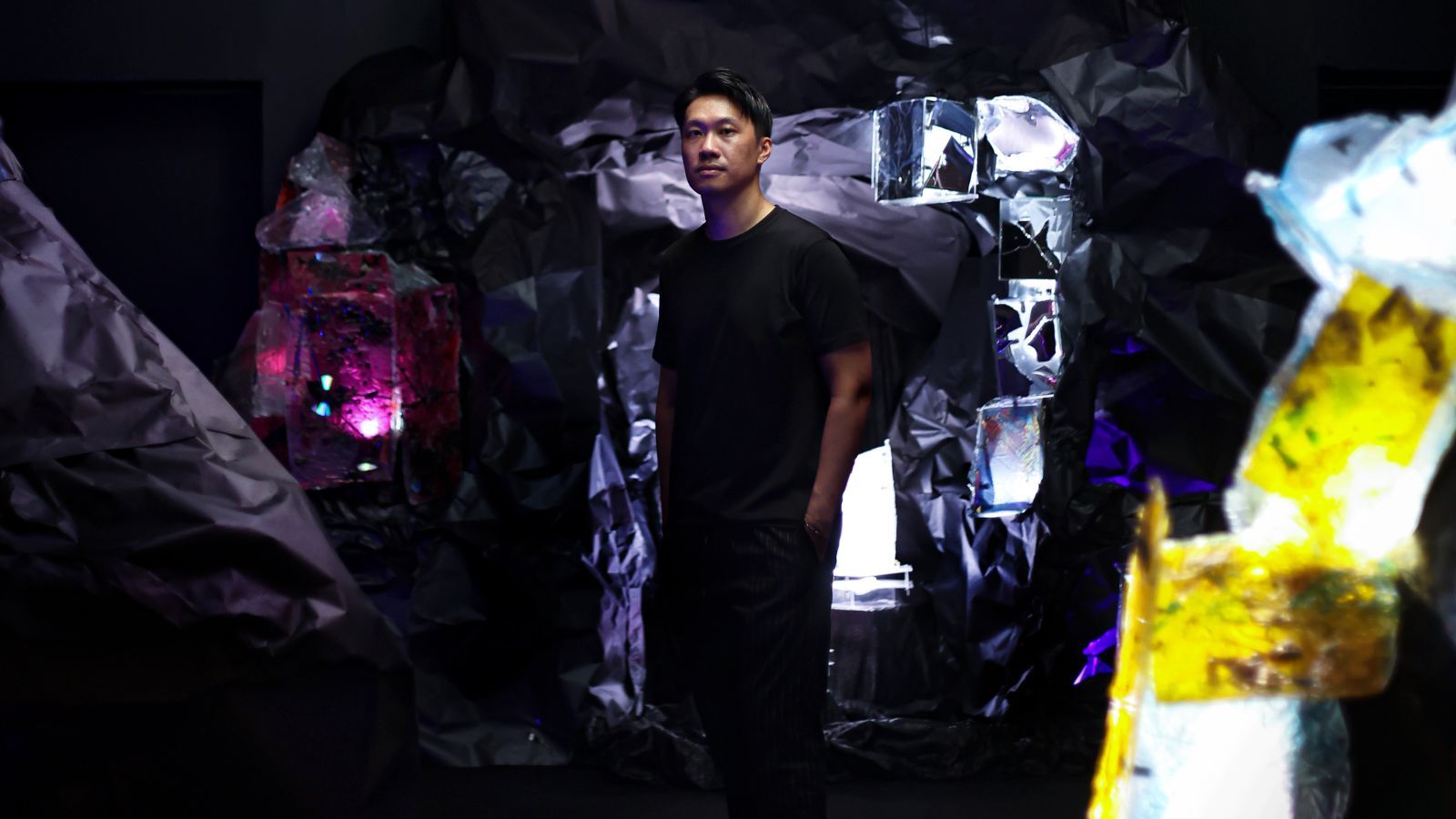 Light artist Jun Ong in the Krystal Valley exhibition at the National Art Gallery