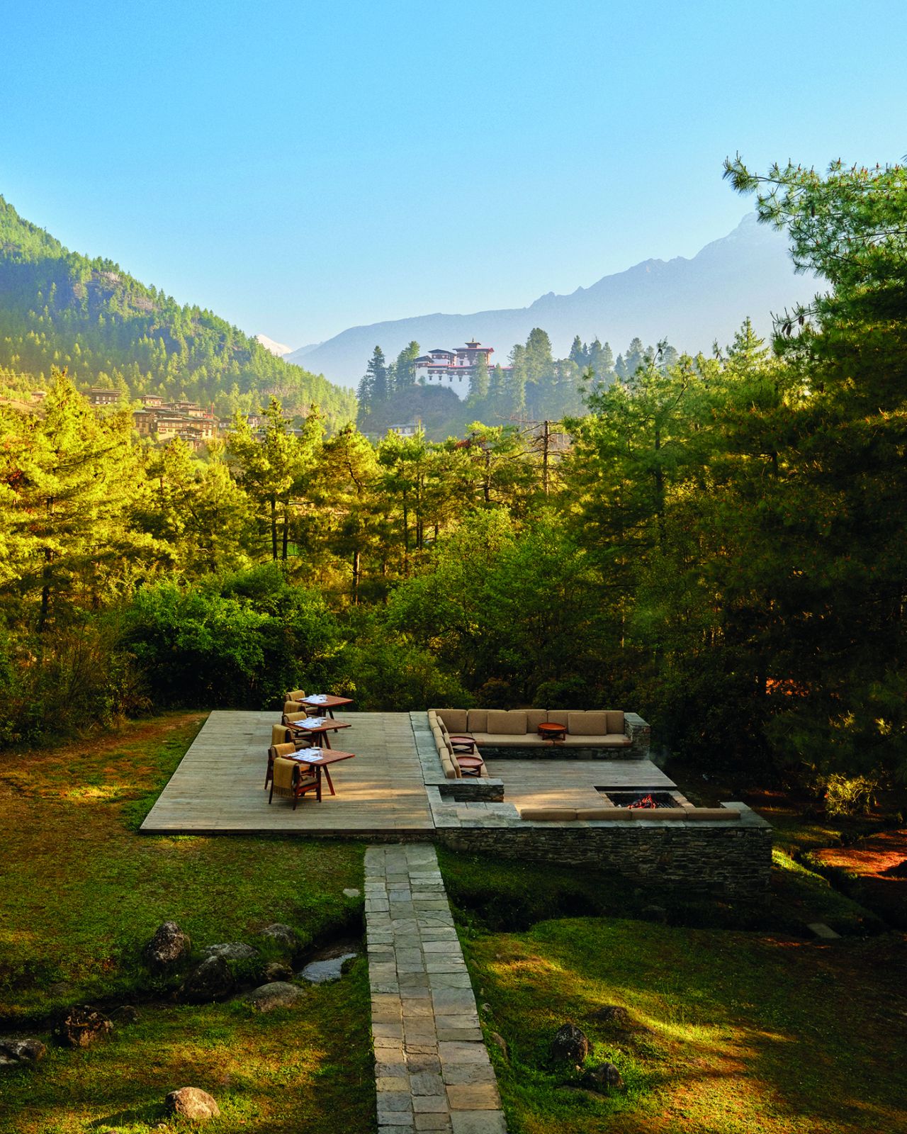 Firepit terrace with Drukgyel Dzong and Jomolhari mountain view at Amankora Paro