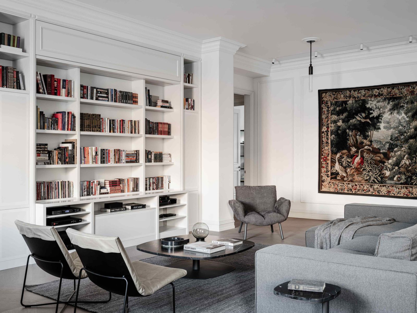 Design icons anchor the airy living room