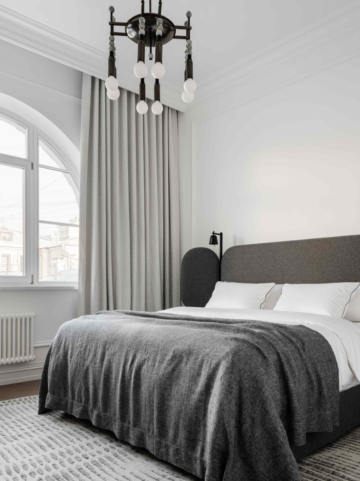 Grey-padded Wings bed by Spanish designer Jaime Hayon