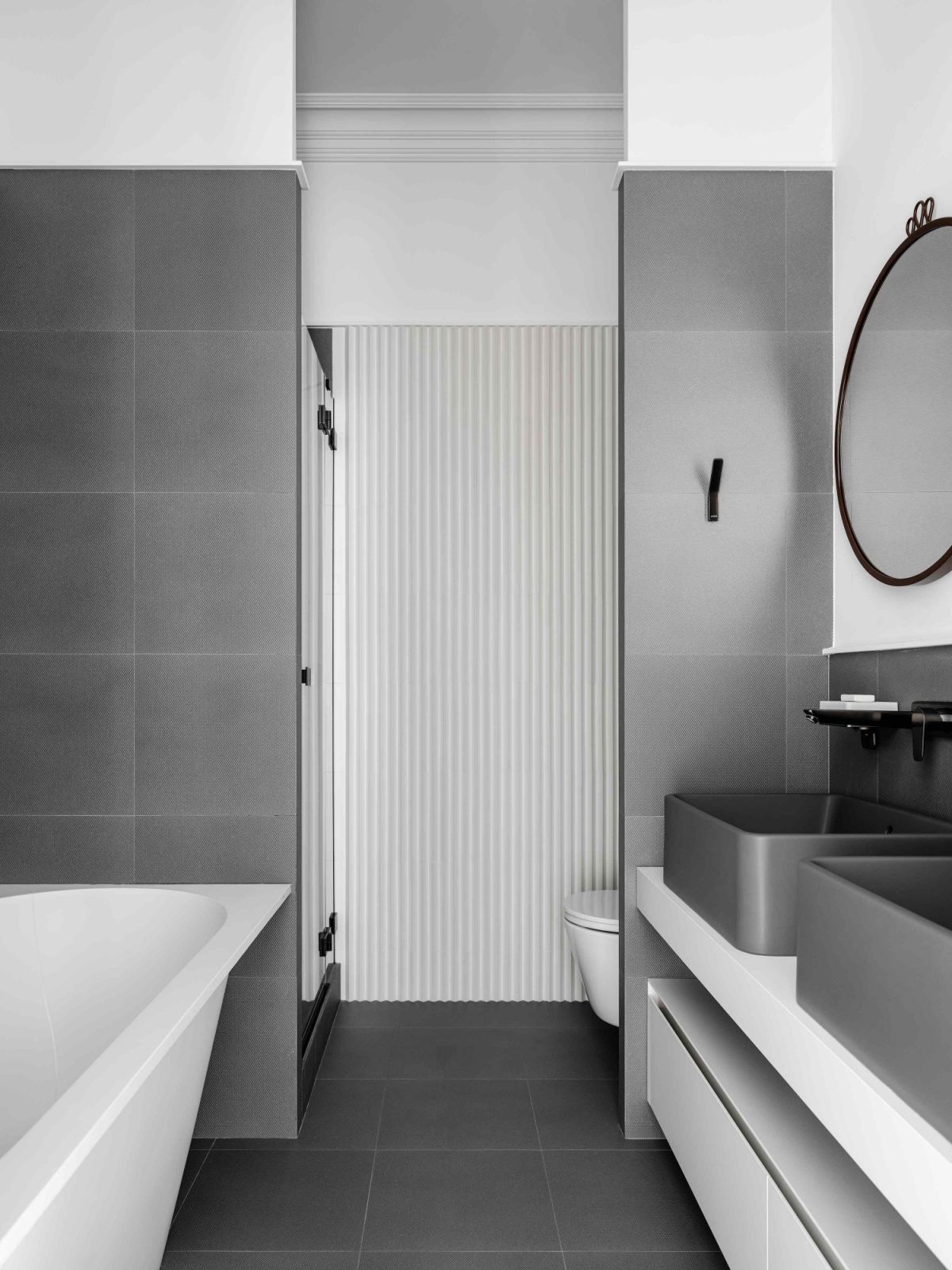 Shades of grey amidst an interplay of graphic lines