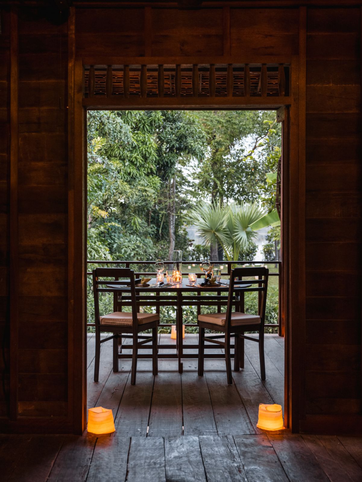 Twilight dinner table setting at Khmer Village House at Amansara