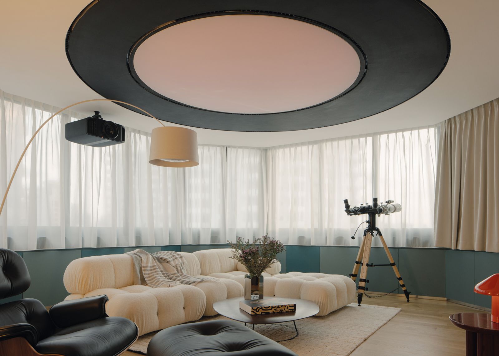 Dark green accents pair well with the B&B Italia Camaleonda sofa and Herman Miller’s Eames lounger