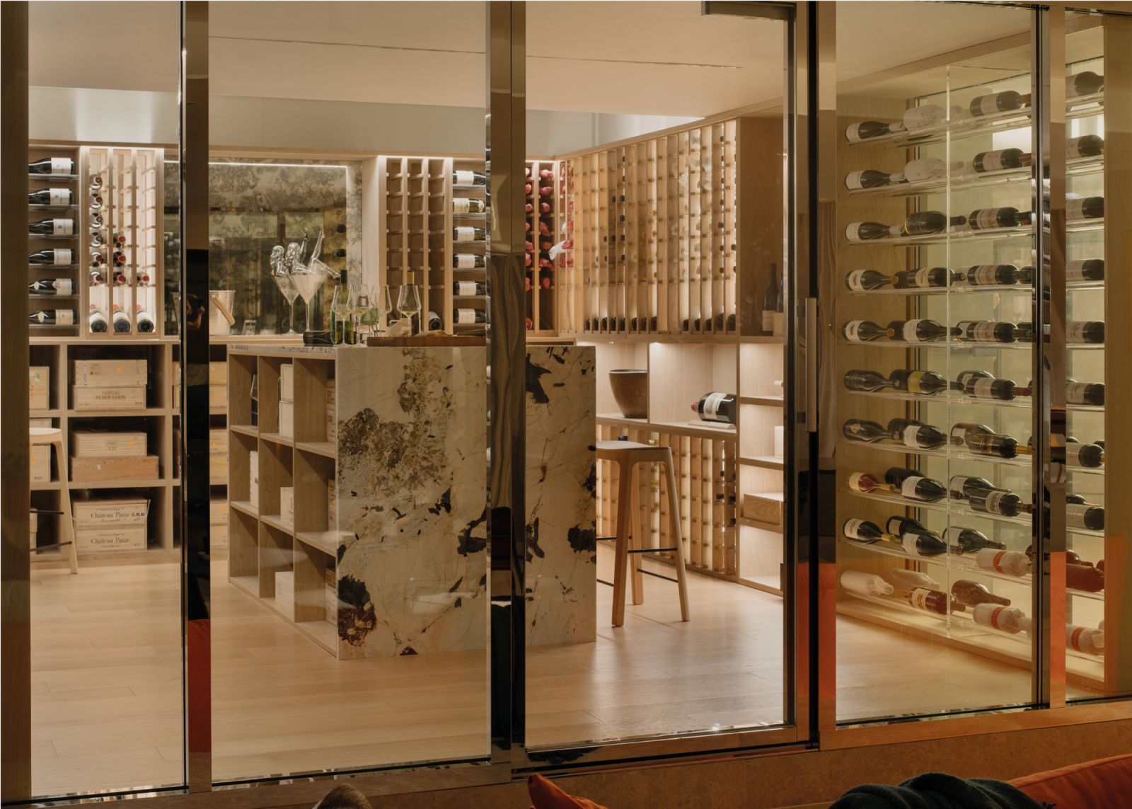 This glass-encased, restaurant-worthy wine room was formerly the family room