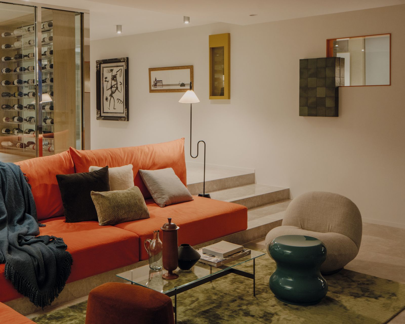 The clever placement of the sunken living room’s sofas lends it an amphitheatre-like feel