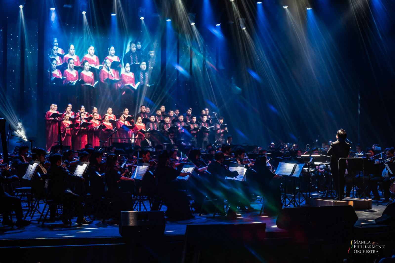 The Philippine Madrigal Singers alongside the UST Choir