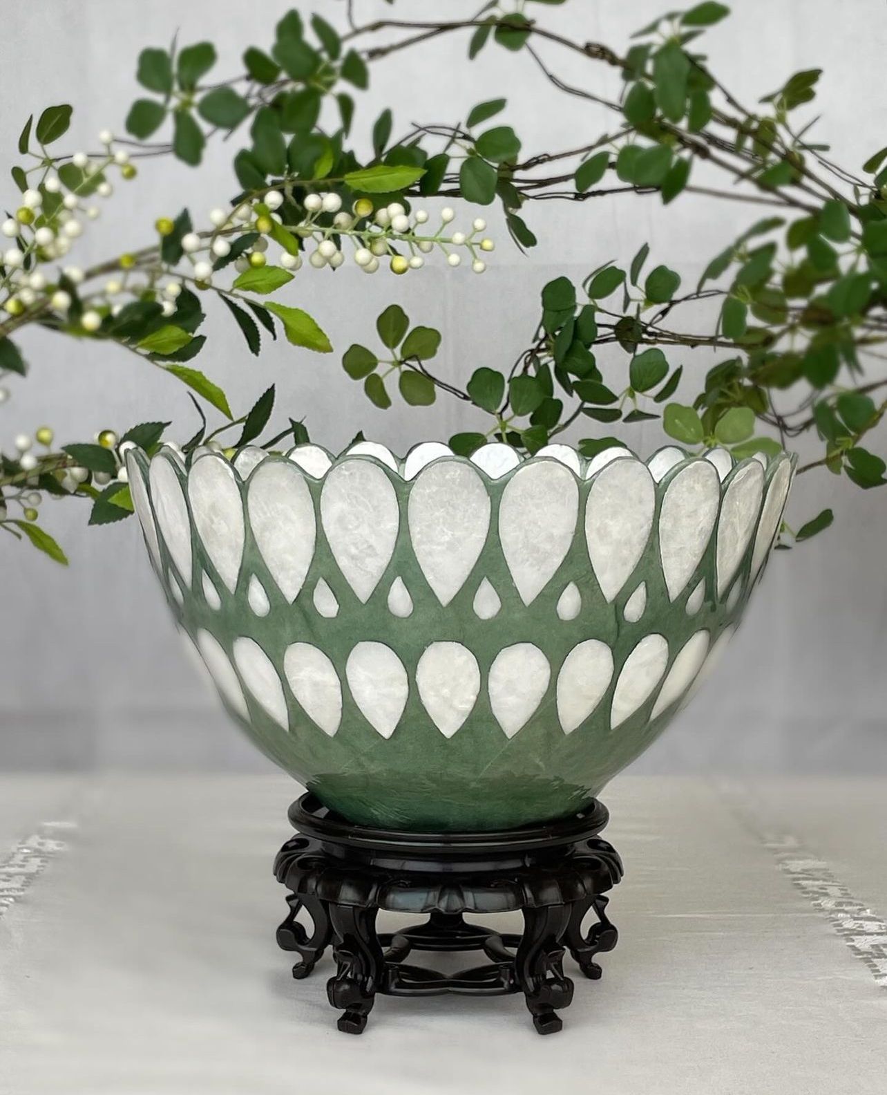 Hand made capiz bowl in sage green (Photo: Instagram / Bahia)