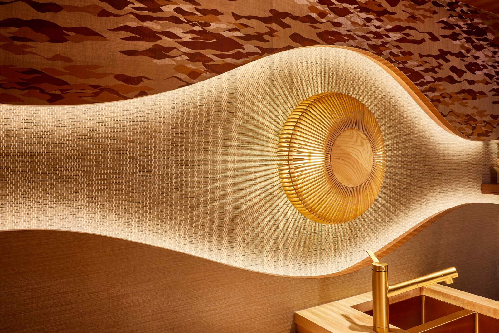 Warm, gold-toned metalware adds touches of luxury and comfort