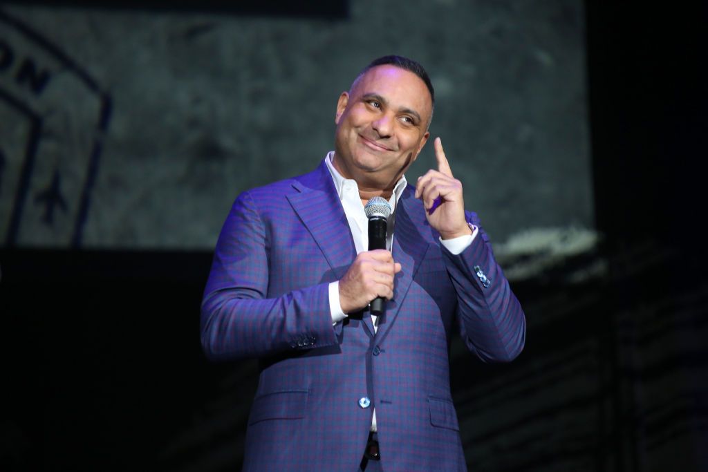 Russell Peters’ energy on stage is infectious and his quick-witted crowd work often becomes the highlight of the night (Photo: Getty Images)