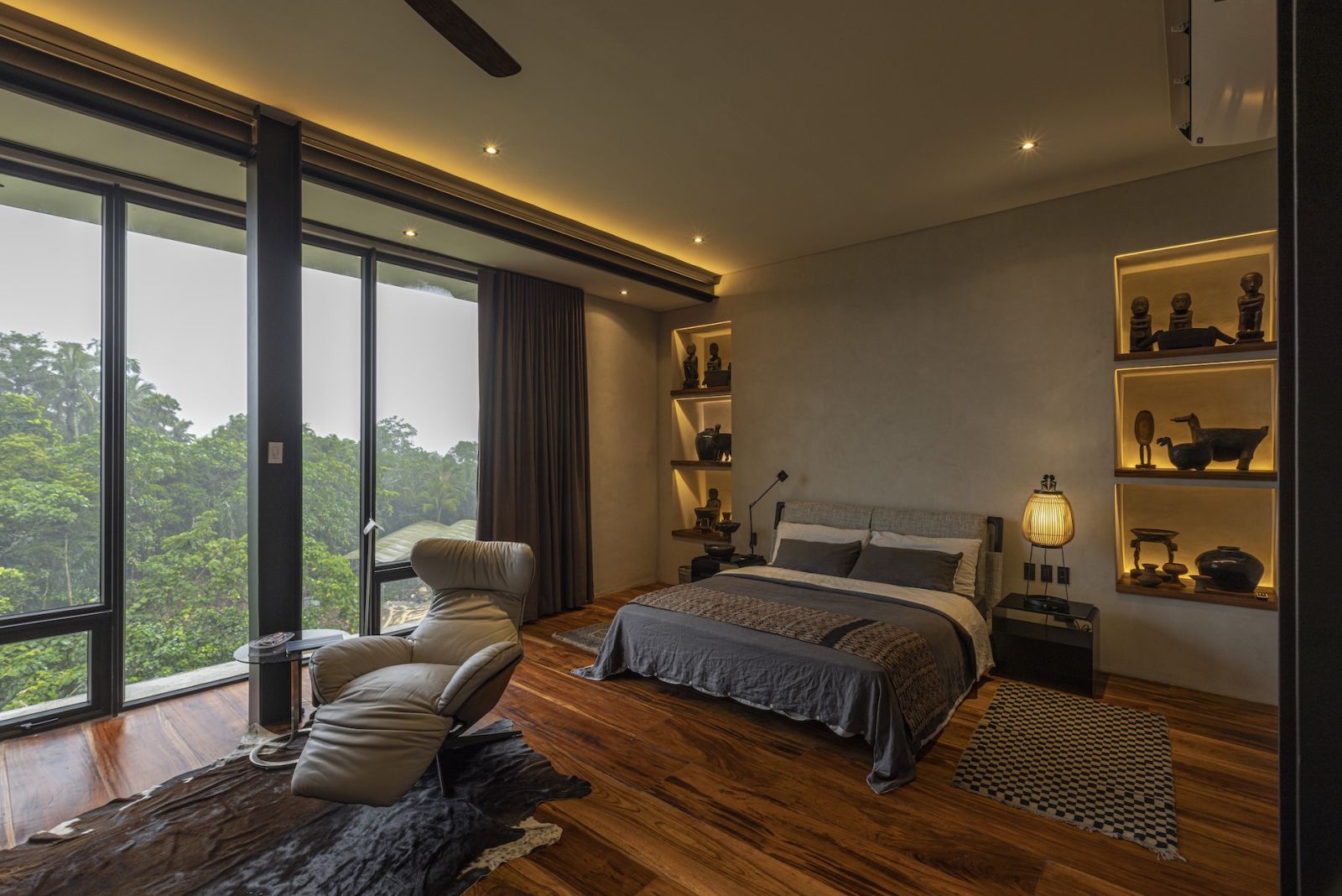 The master bedroom, with the homeowner's extensive collection of statues