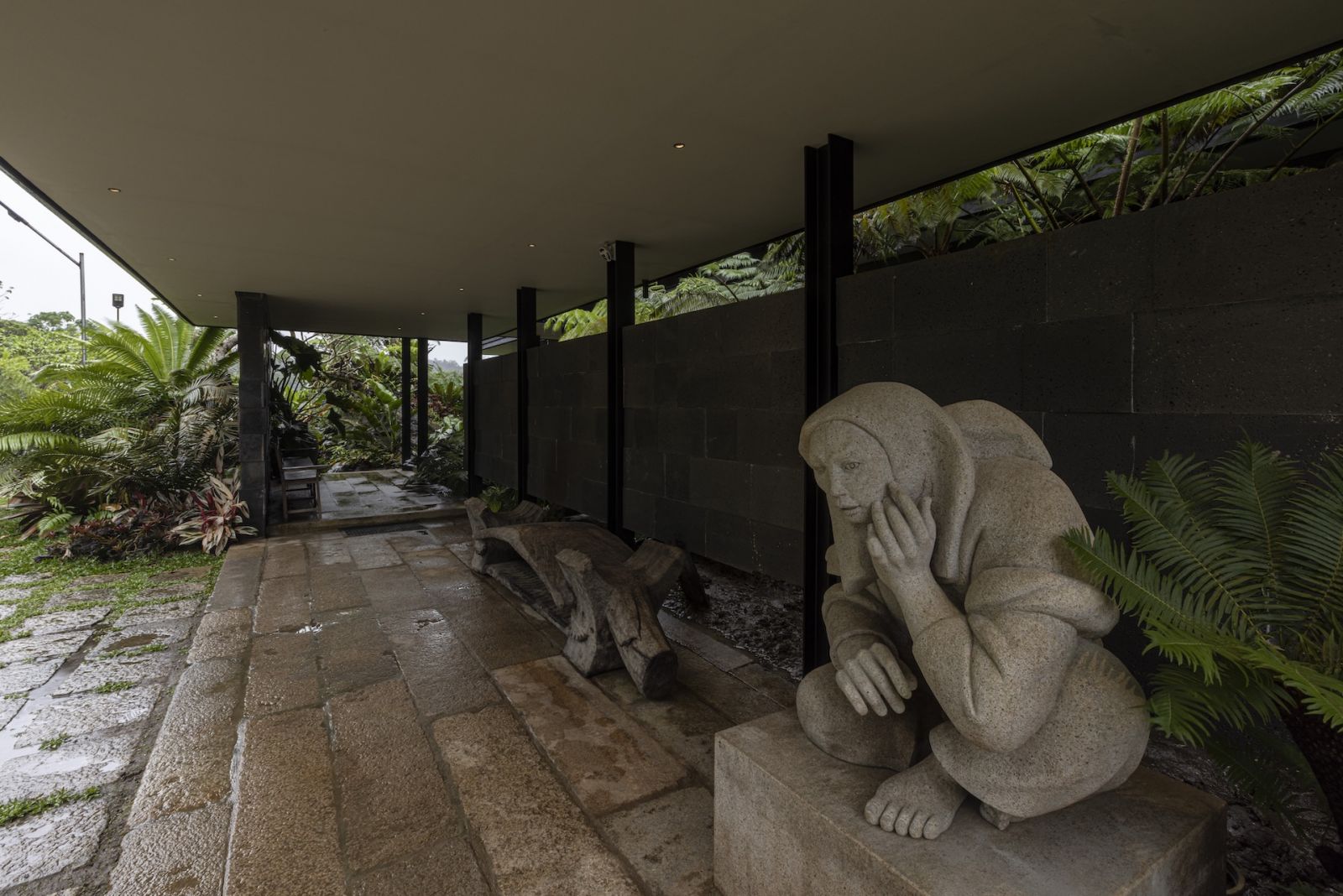 The stone courtyard, which features a distinctive sculpture by Ben Cab