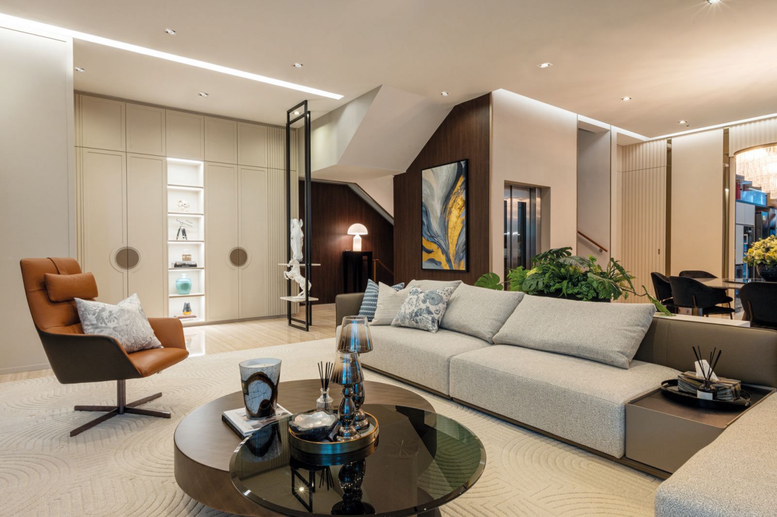 Ivory, champagne and taupe tones establish a calming feel in the common areas