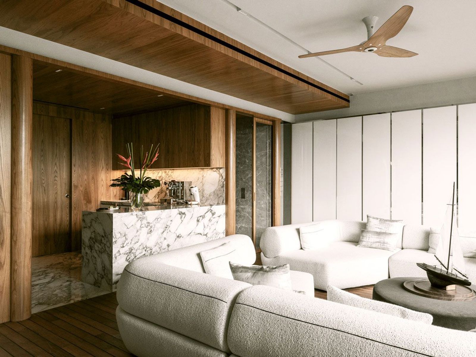 The marble counter acts as a stylish divider between the entryway and the living area