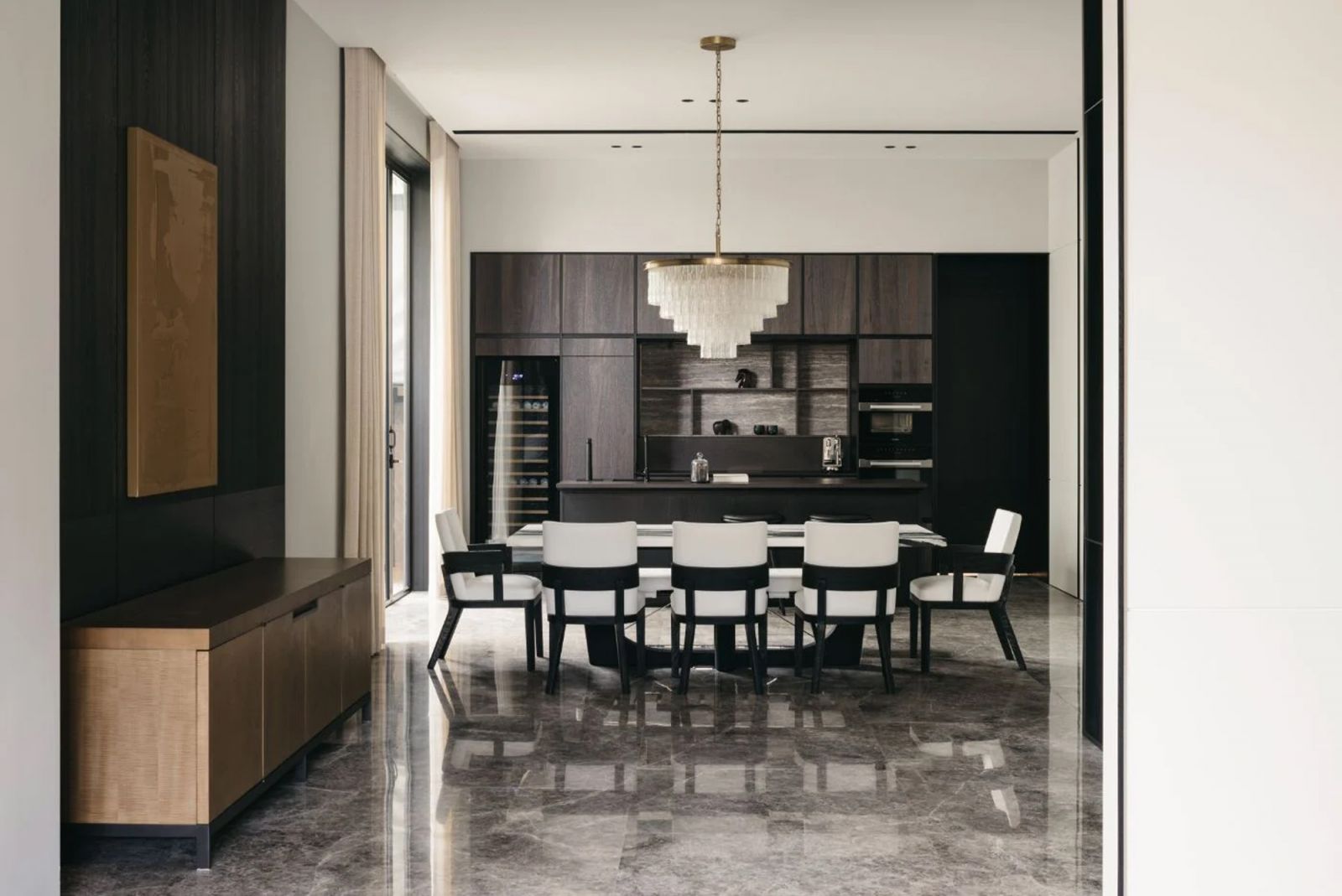The Liaigre Sumi table takes pride of place in the dining room of this semi-detached house in Bukit Timah, designed by Joey Khu Interior Design