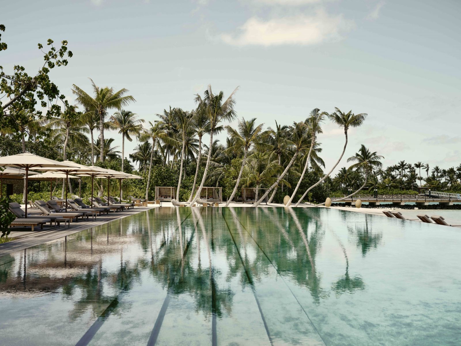 Veli bar pool at Patina Maldives