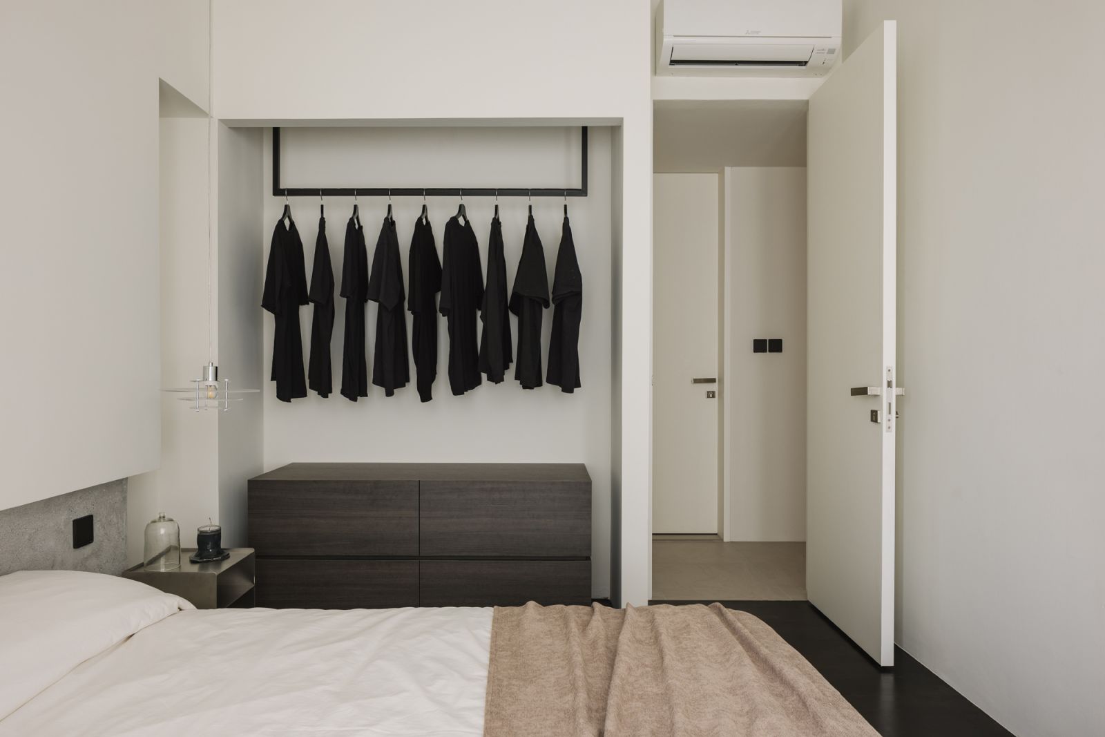 The space-savvy bedroom at De Royale