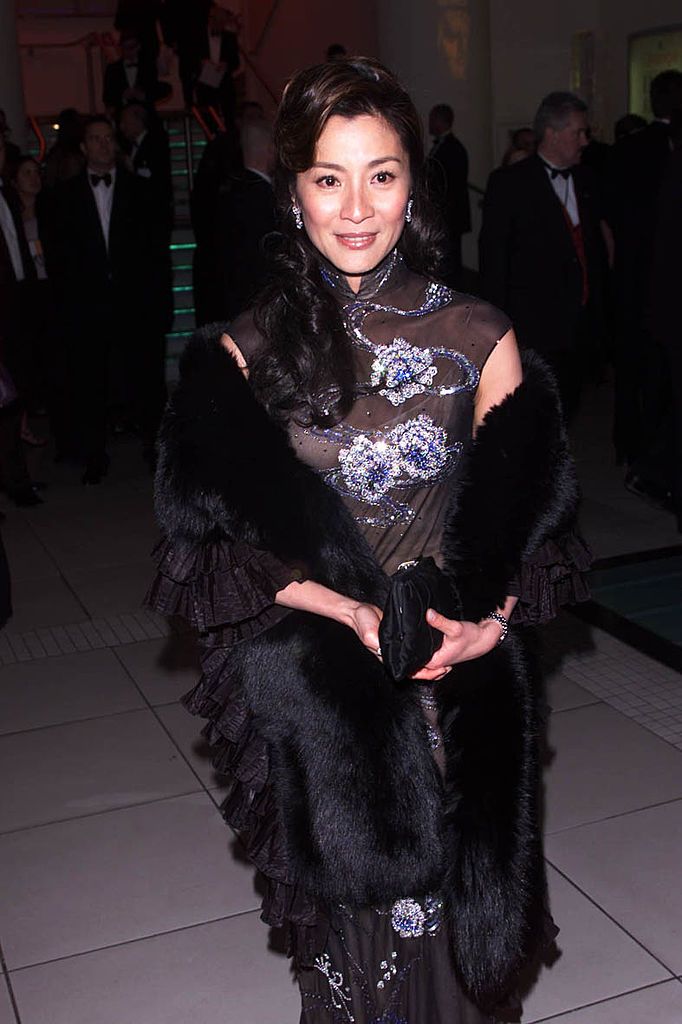 LONDON - FEBRUARY 25: Chinese actress Michelle Yeoh arrives at the BAFTA party held at the Grosvenor House Hotel on February 25, 2001 in London. (Photo by Dave Hogan/Getty Images)