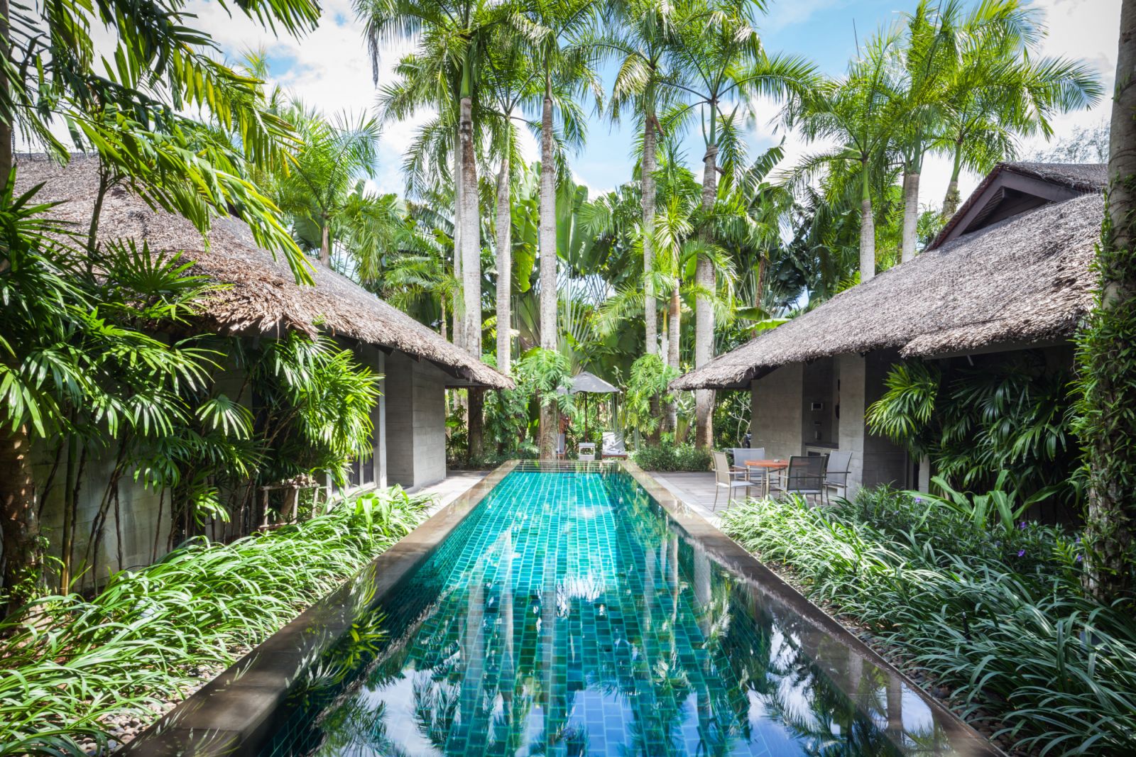 One-bedroom pool villa lagoon pool at The Slate Phuket