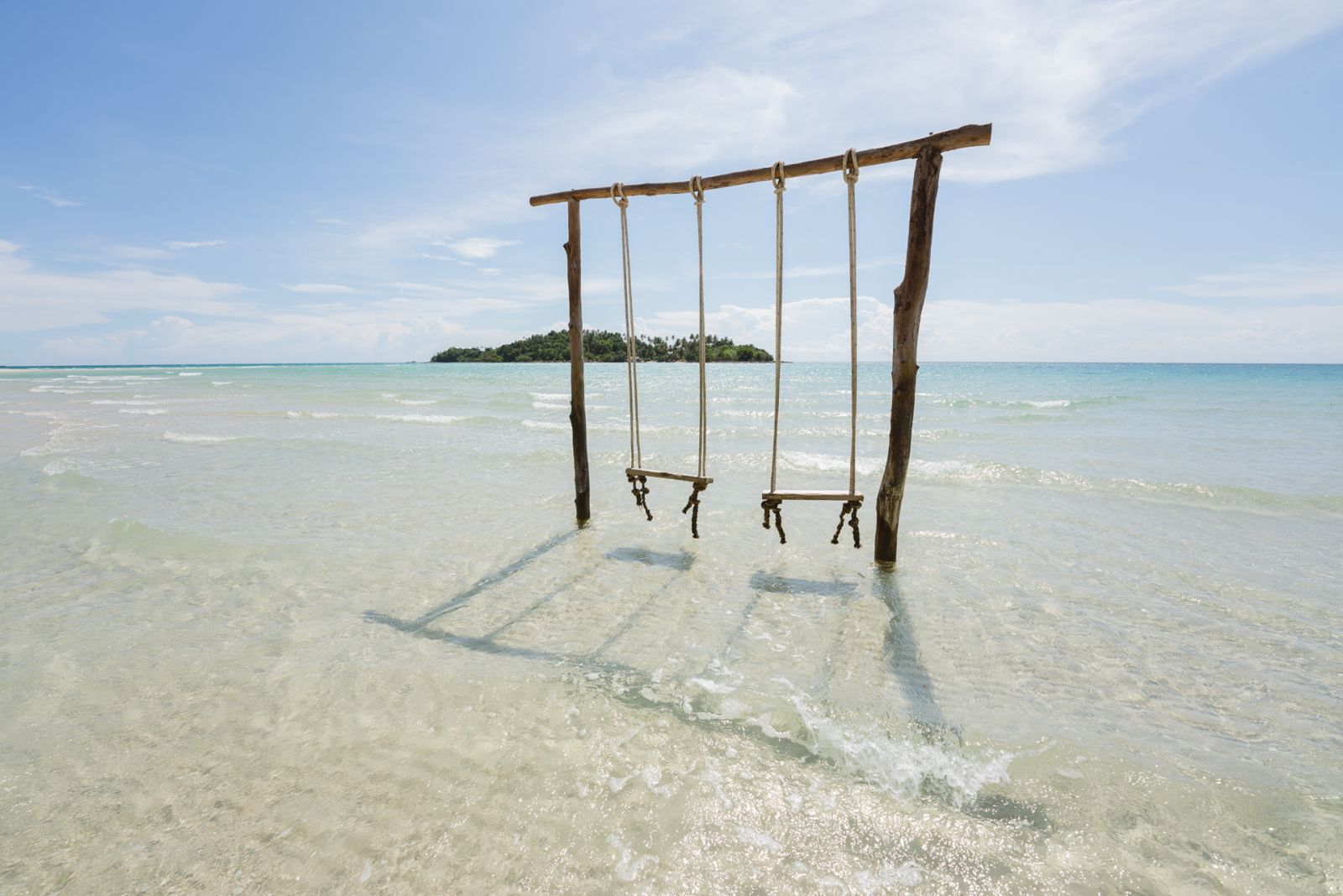 Swings at South Beach at Soneva Kiri