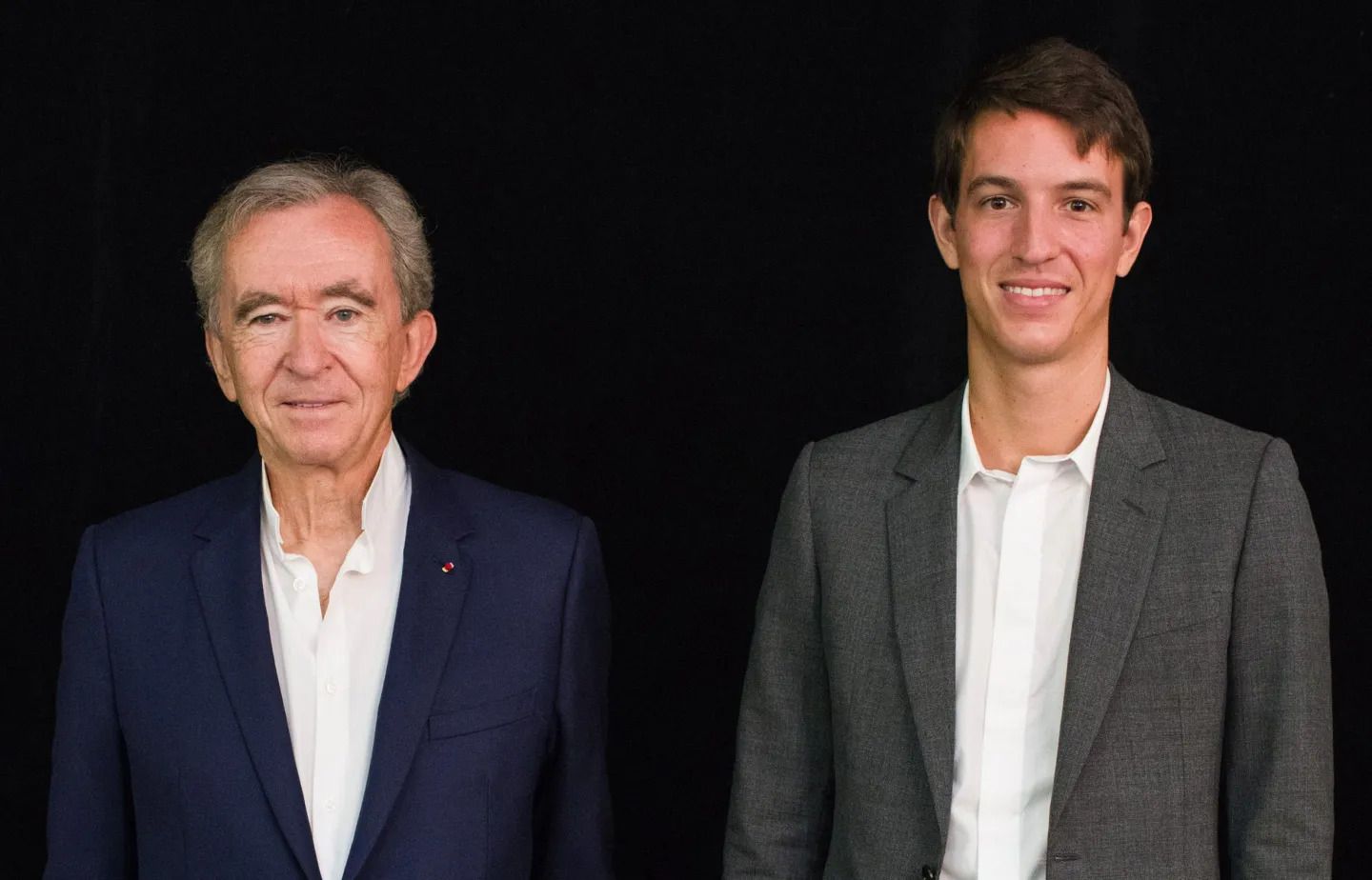 Bernard Arnault (trái), tỷ phú và chủ tịch của LVMH Moet Hennessy Louis Vuitton SE và con trai thứ 3 là Alexandre Arnault. Ảnh: Getty Images