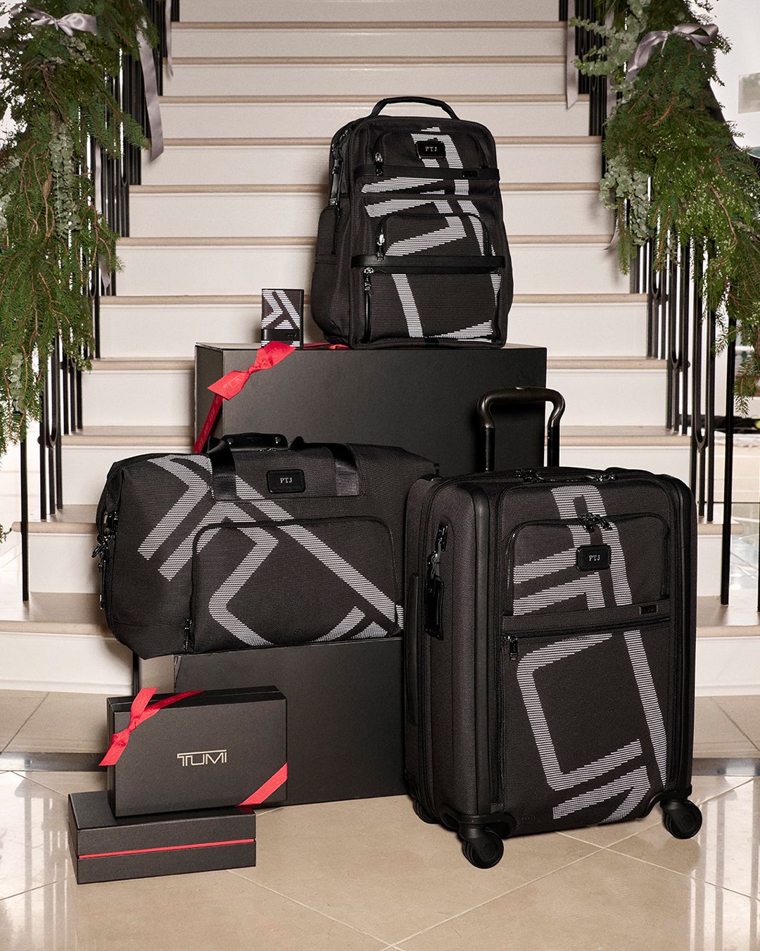 Tumi Alpha collection in reflective Tumi jacquard