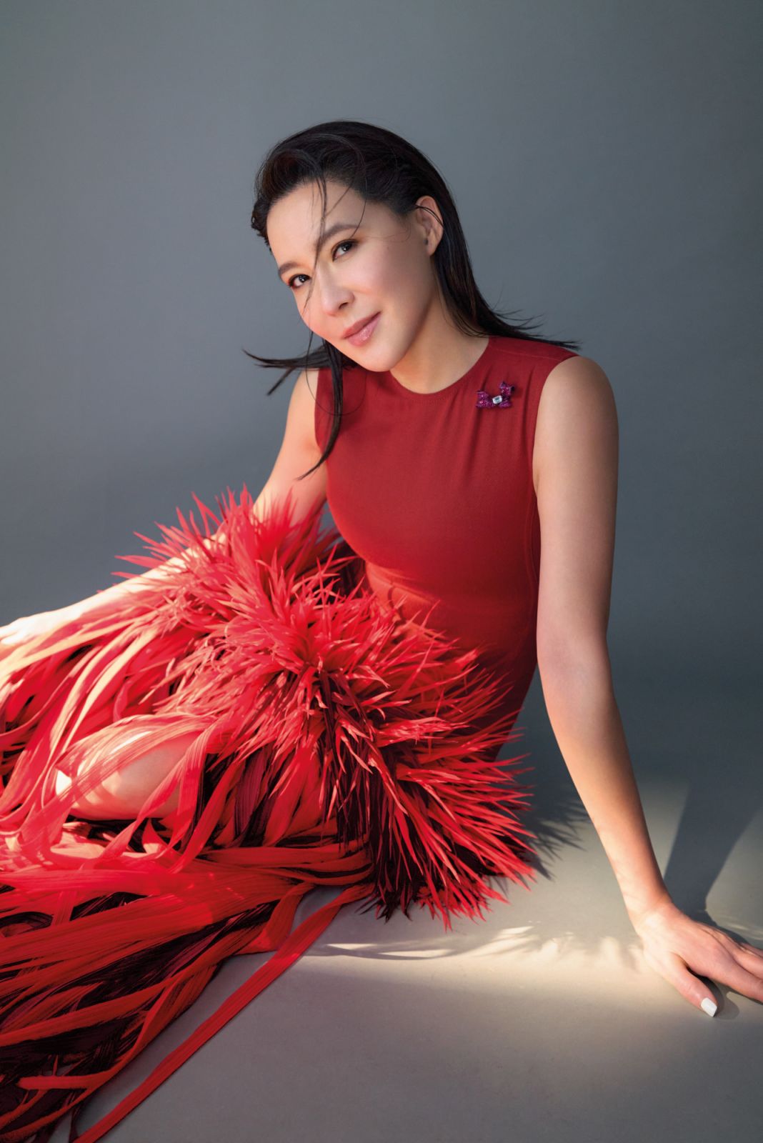 Cindy Chao wearing a Bottega Veneta dress and CINDY CHAO The Art Jewel 20th Anniversary Collection’s Ribbon Brooch (Photo: courtesy of Ming Shih Chiang)
